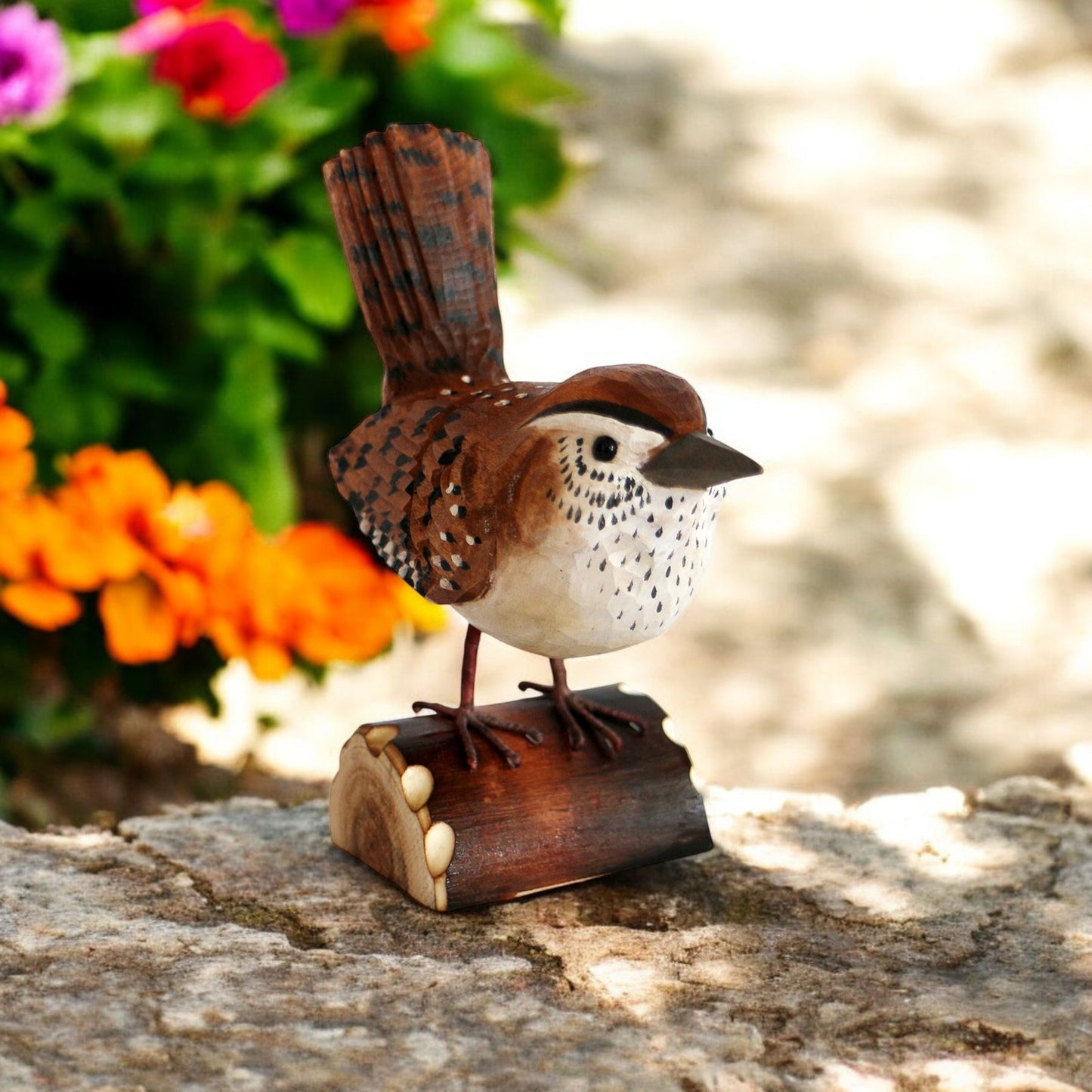 a small bird sitting on top of a piece of wood