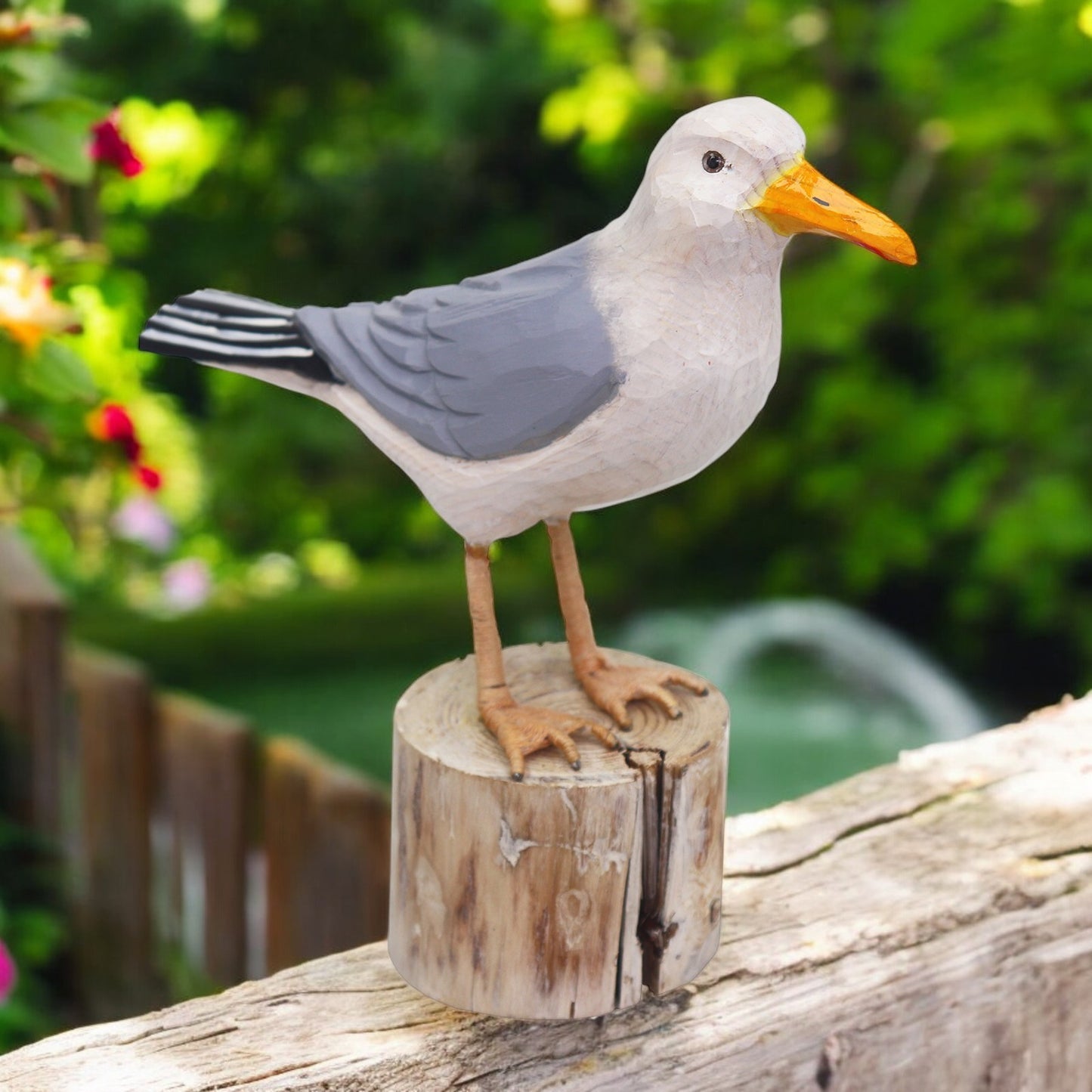 a bird sitting on top of a wooden post