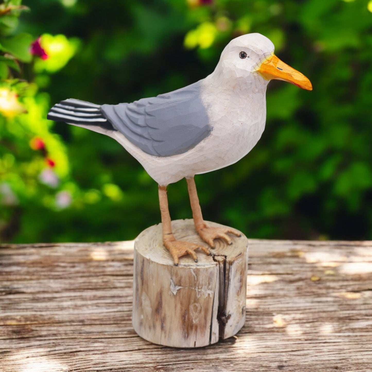 a bird sitting on top of a wooden stump